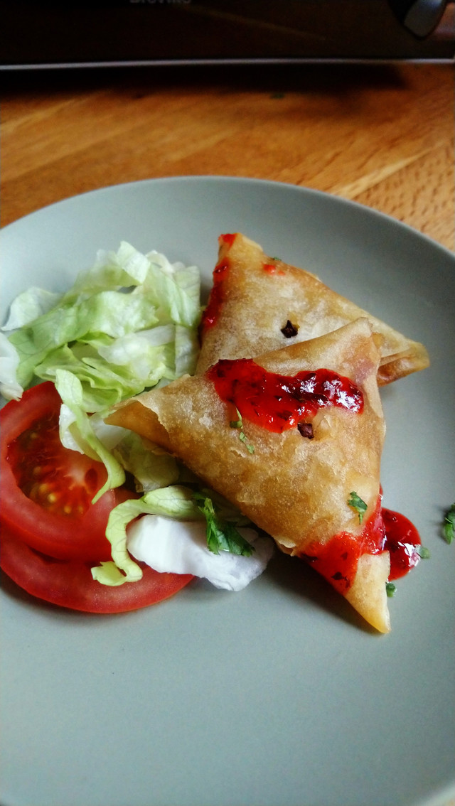 Lamb samosa. Chicken curry and rice.